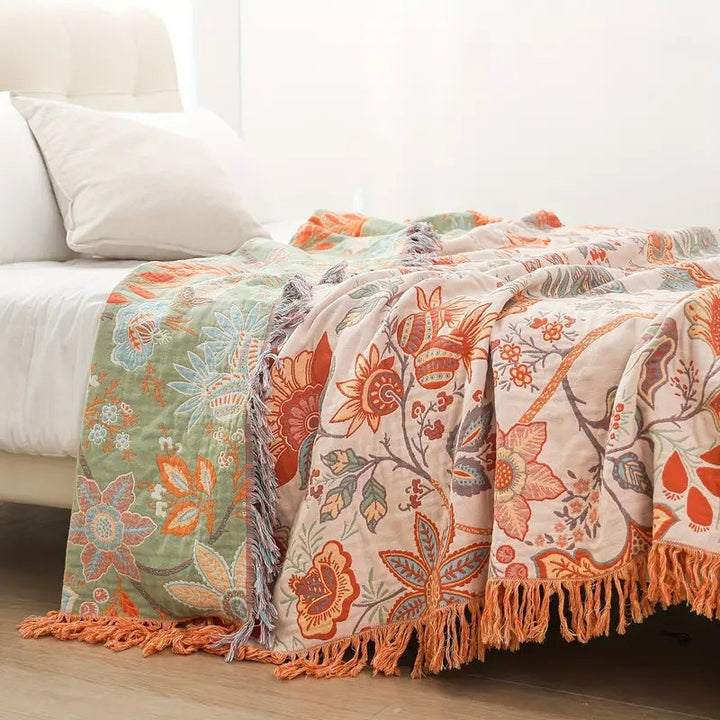 Soft boho floral cotton throw blanket for bohemian home decor. Rustic decorative accent & cozy gift idea.