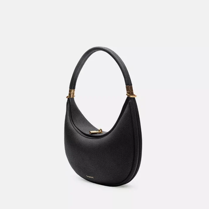 Elegant women's handbag worn as a crossbody, shoulder bag, or clutch, ideal for daily use and style.