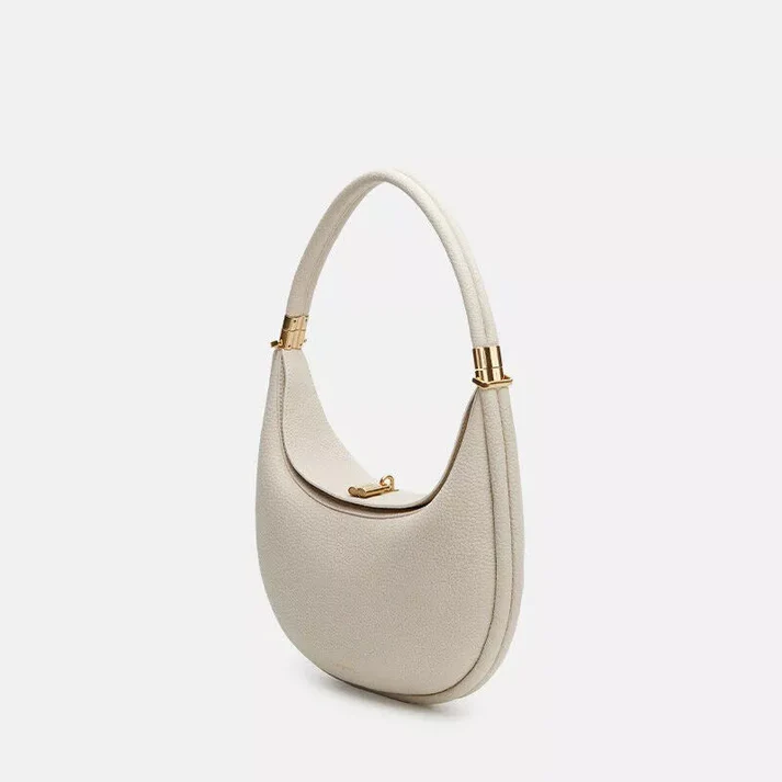 Women's everyday elegant handbag, a versatile fashion accessory, functions as a shoulder or crossbody bag.