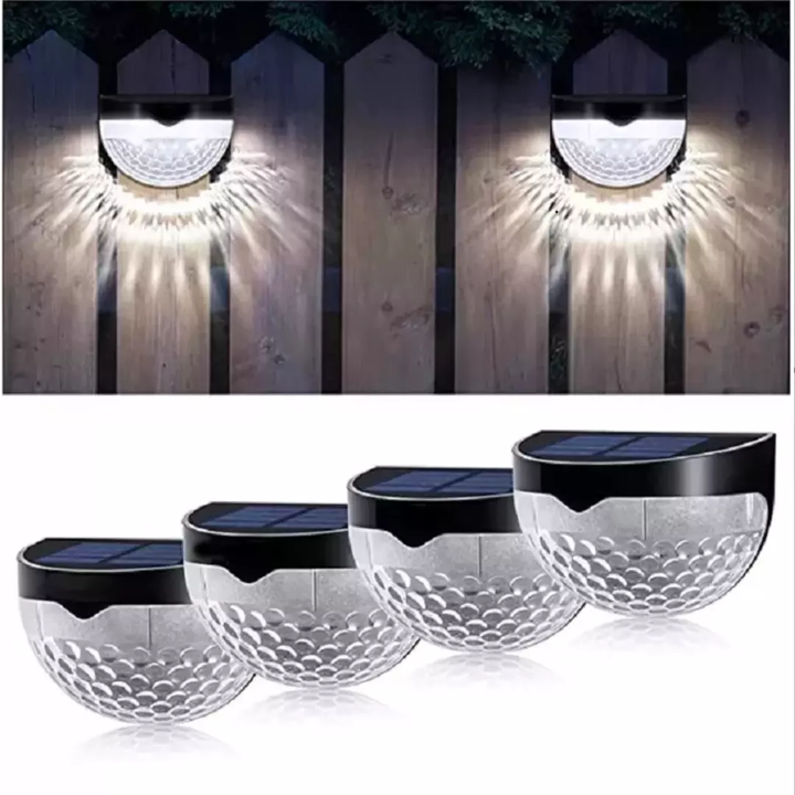 Sleek solar wall lamp installed outdoors, collecting sunlight. Waterproof LED light for hassle-free garden decor.