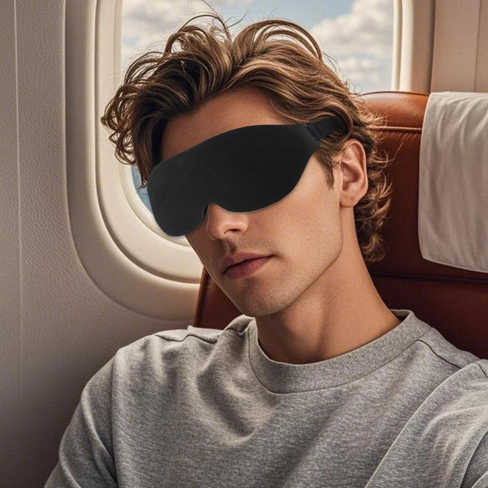Close-up of a plush, comfortable sleep eye mask, designed for complete darkness and restful sleep.