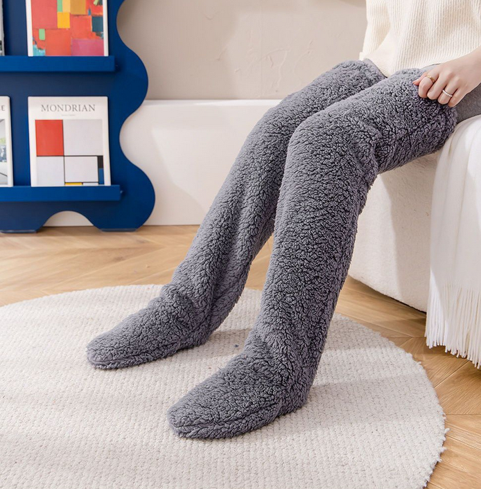 Extra long, cozy winter socks for women, ensuring warmth and comfort against the cold.