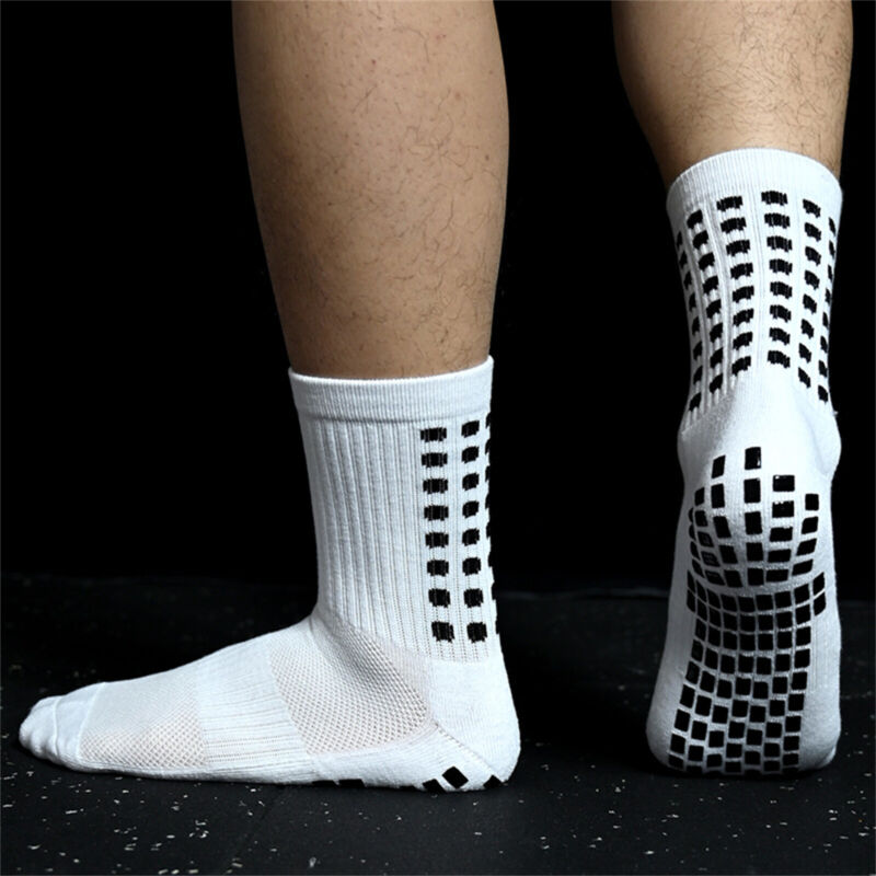 Workout gear: Unisex mid-calf sports socks with powerful grip for soccer. Enhances agility & stability.