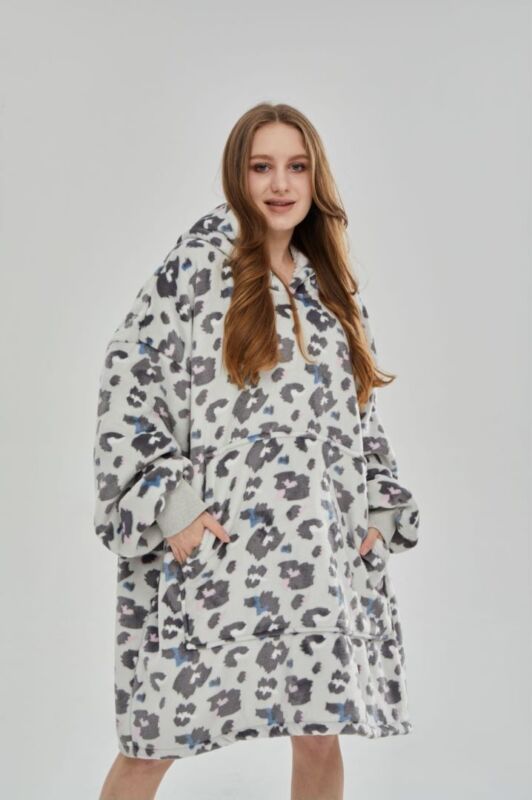 Oversized blanket hoodie in a leopard print design, offering stylish warmth & comfort.