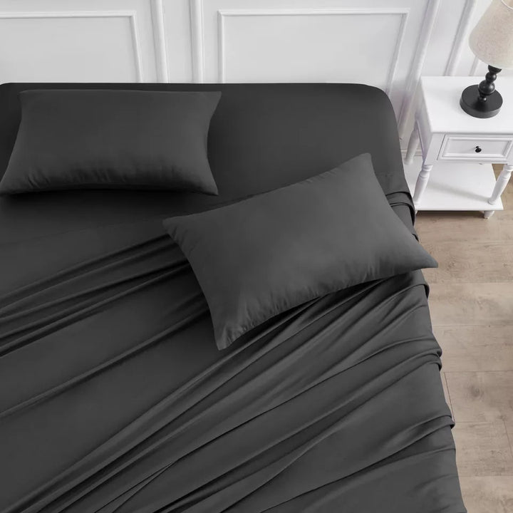 Ideal summer bedding: bamboo cooling sheet set, featuring a flat sheet, fitted sheet, and pillowcases for cool sleep.