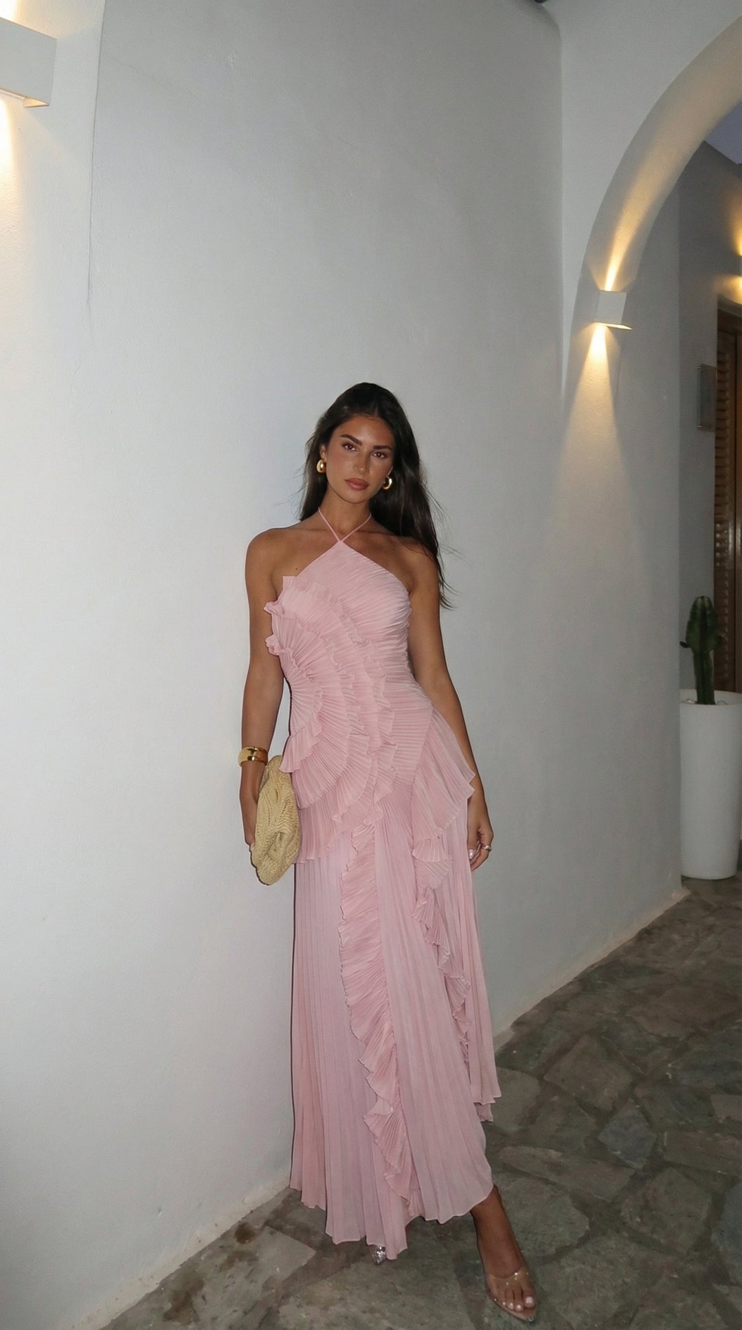 Chic women's cocktail dress: halter neck, flowing ruffle maxi design for elegant party wear.