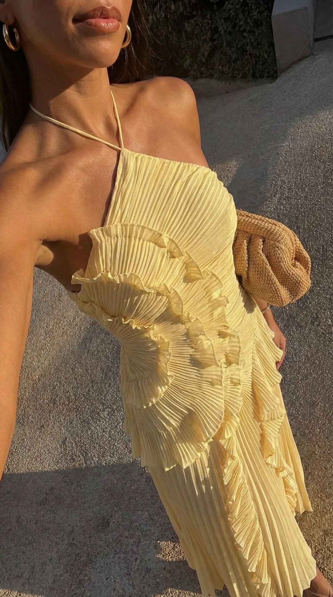 Elegant women's halter neck maxi dress with cascading ruffles, ideal for cocktail and formal wear.