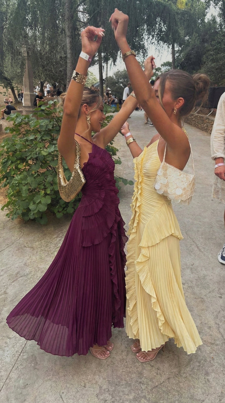 Chic women's party dress: halter neck, asymmetrical ruffles, long maxi length for evening wear.