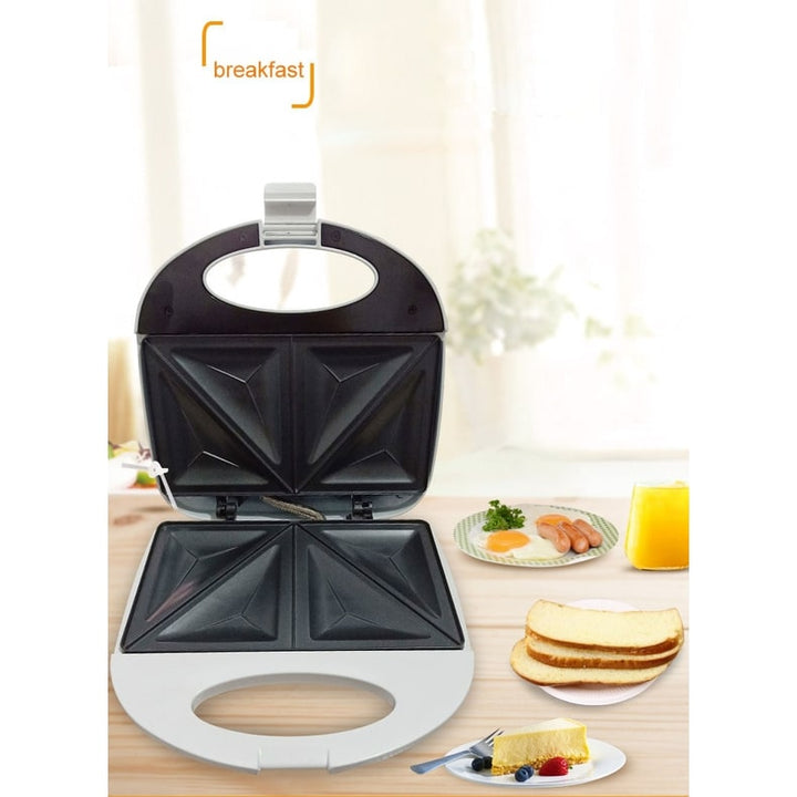 Compact electric sandwich grill, non-stick for easy cleanup, ideal for paninis, toasts & quick meals.