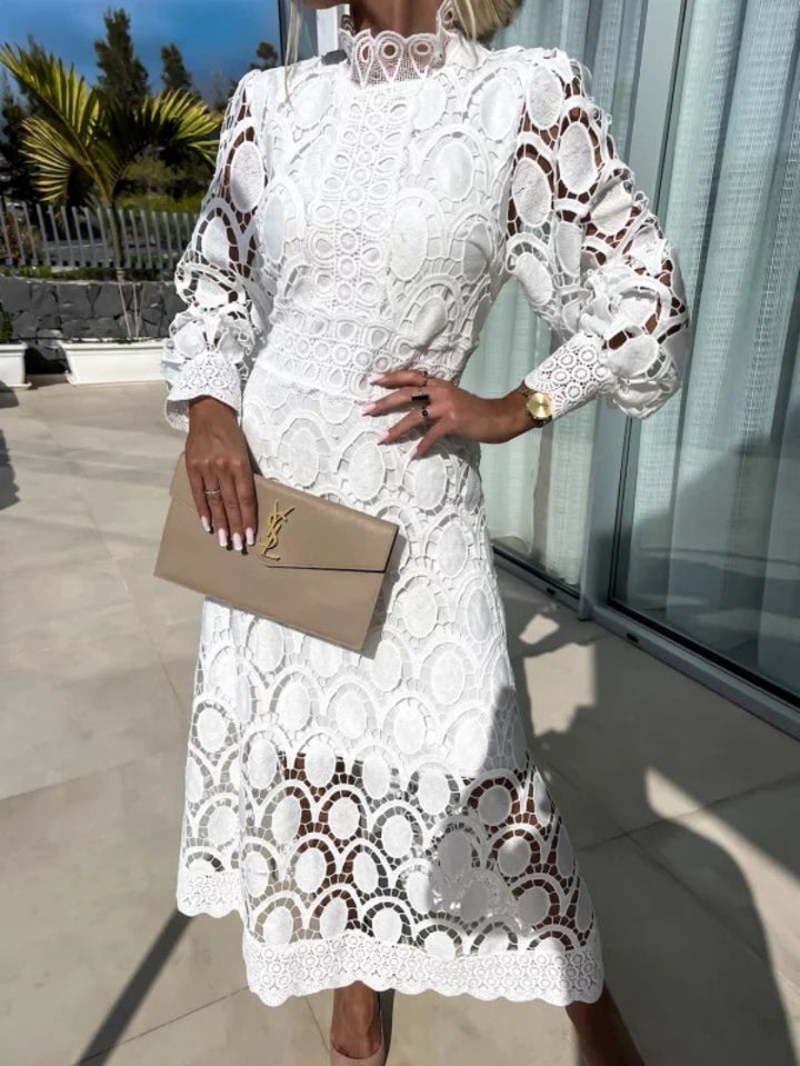 Chic women's elegant crochet lace midi dress, a beautiful formal wear choice for evening parties.