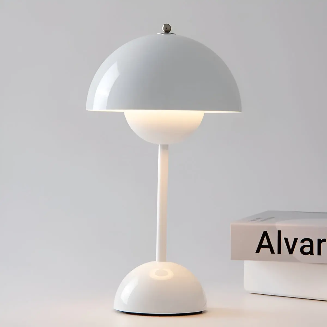 Portable wireless LED table lamp, battery-powered for versatile home lighting.