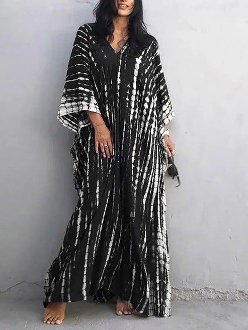 Women's bohemian tie-dye kaftan maxi dress, perfect for a casual summer day or evening.