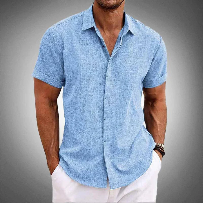 Crisp white men's short sleeve button-up, relaxed fit, breathable & stylish for summer casual outfits.