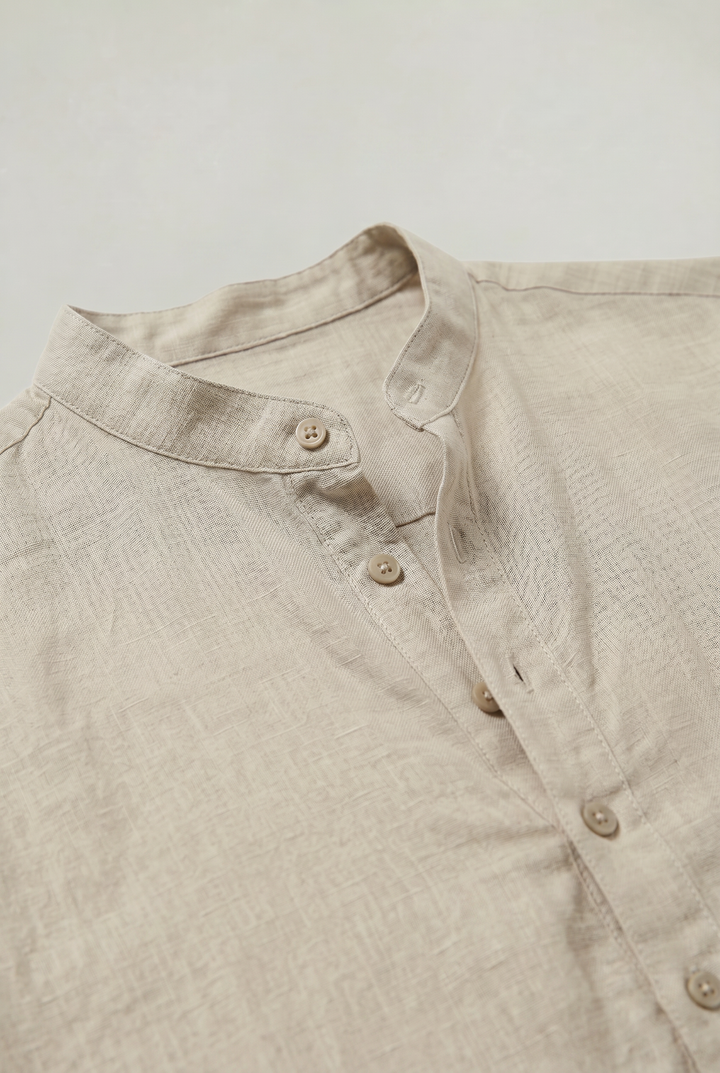 Breathable men's grandad collar shirt with roll-up sleeves, essential for summer holiday comfort.