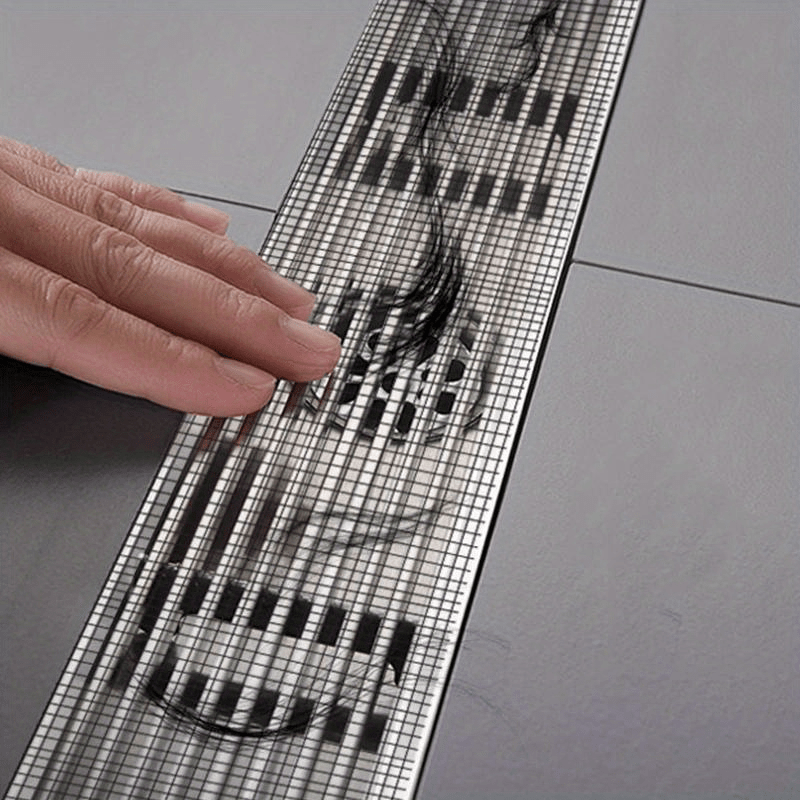 Practical self-adhesive drain mesh cover (2 rolls) to catch hair and food scraps, preventing costly plumbing clogs.