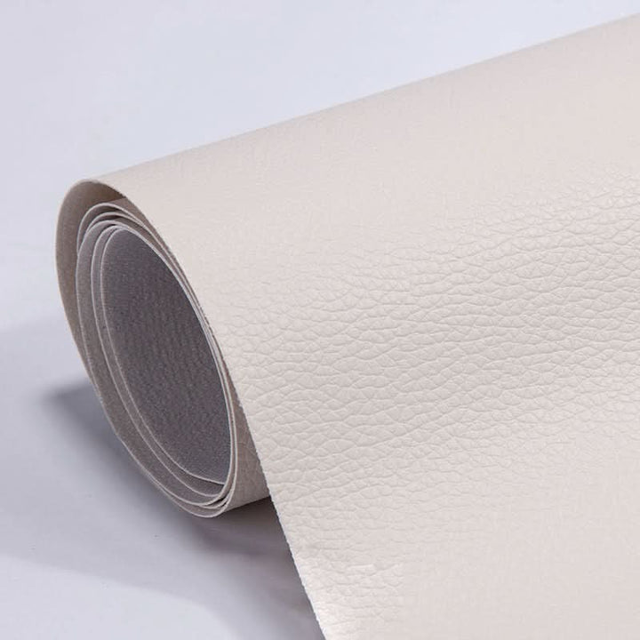 Versatile 19.7x53.9" self-adhesive patch for leather, vinyl, faux leather furniture & car seat repairs.