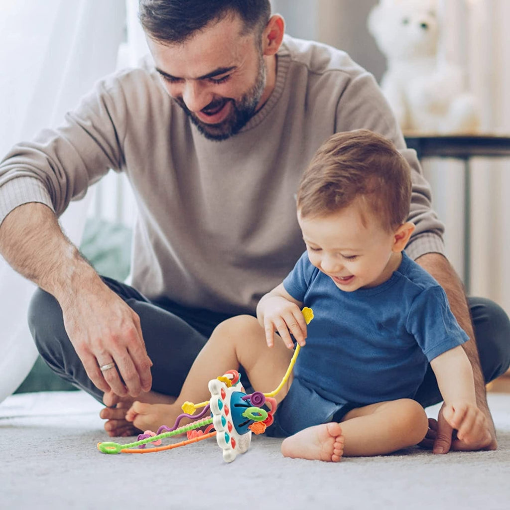 Developmental sensory toy for infants & toddlers. Enhances fine motor skills & provides teething relief with textured cords.