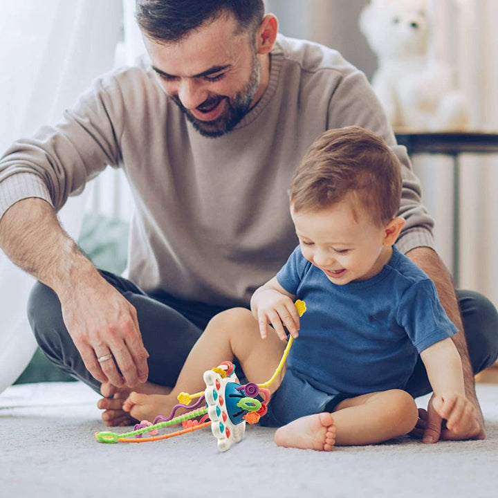 Developmental sensory toy for infants & toddlers. Enhances fine motor skills & provides teething relief with textured cords.