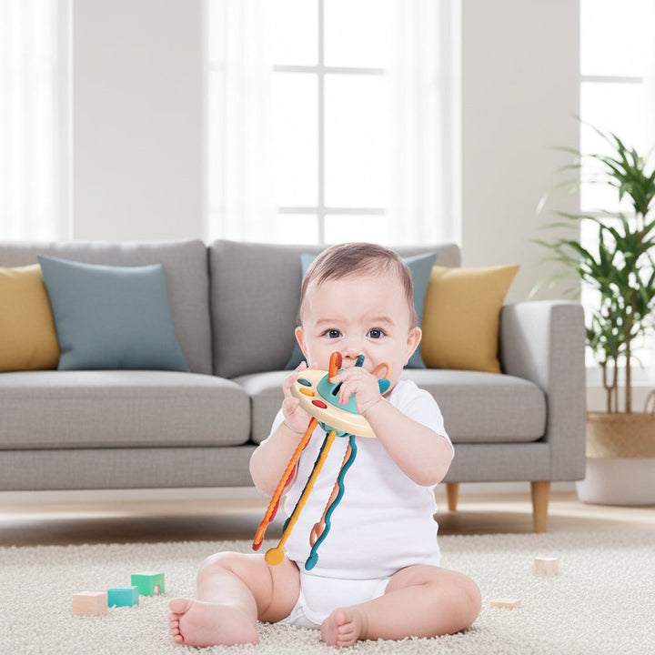 Textured sensory activity toy for babies. Stimulates fine motor skills, provides teething comfort with soft buttons & cords.