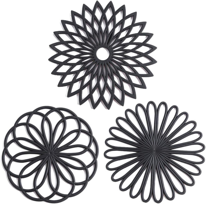 Set of 3 heat resistant silicone coasters for kitchen & dining table protection.