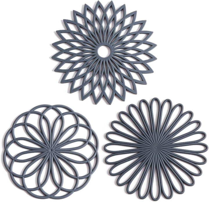 Stylish set of 3 silicone trivets, perfect for kitchen decor & dining table protection.
