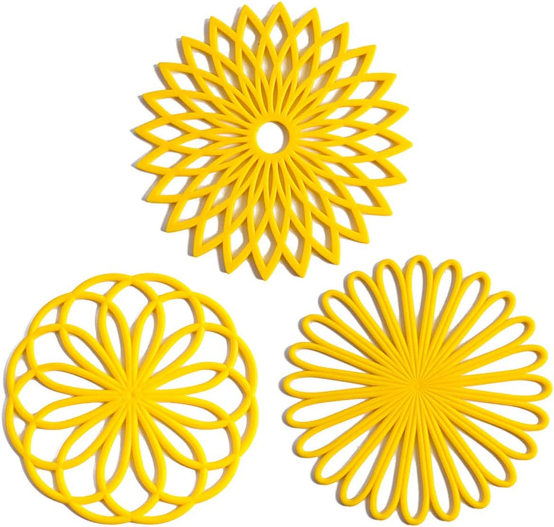 Versatile 3-pack non-slip silicone trivets, perfect as pot holders or warmth pads.