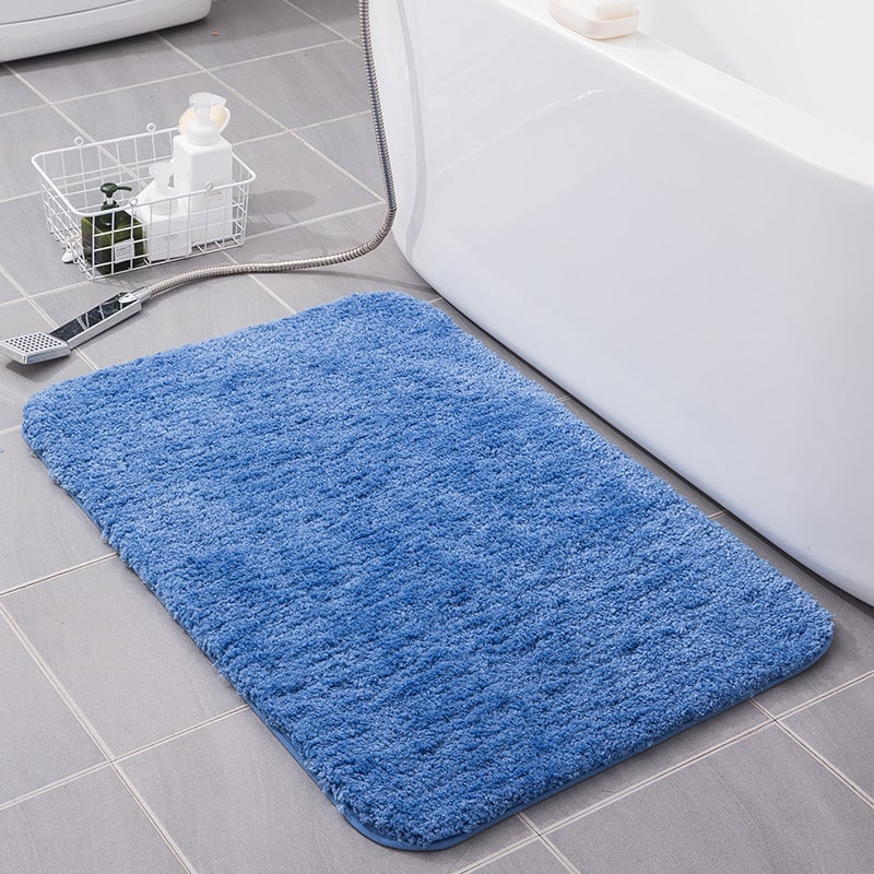 Comfort-focused shaggy bath mat, quick-dry microfiber, non-slip, ideal for any bathroom.