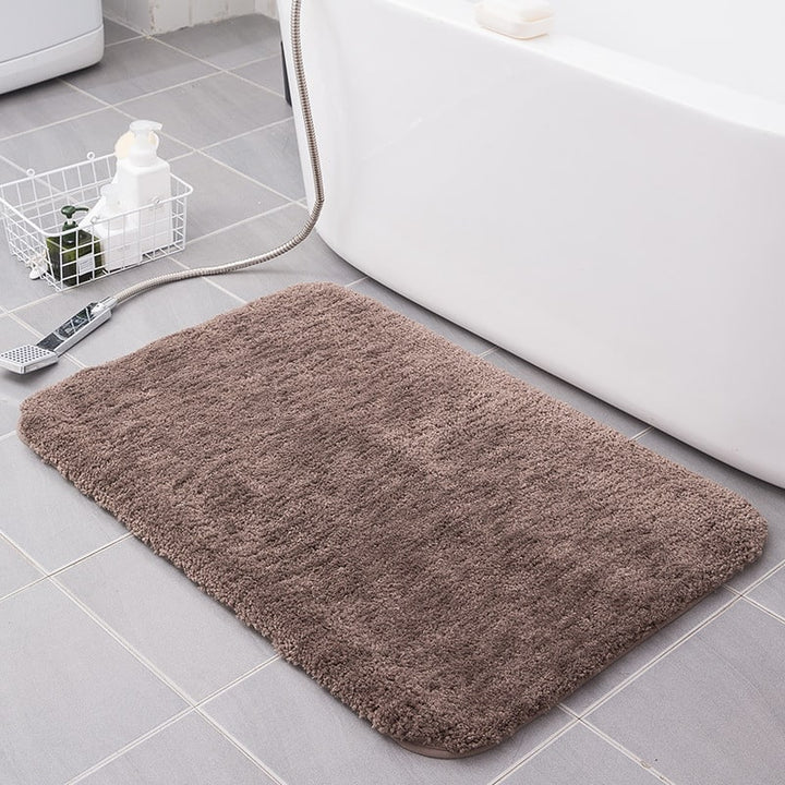 Soft rectangular shaggy bath mat, quick-dry microfiber, ideal floor mat for any bathroom.