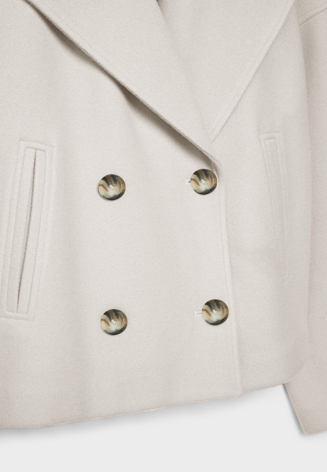 Stylish women's outerwear: a tailored, double-breasted crop jacket, perfect for any occasion.