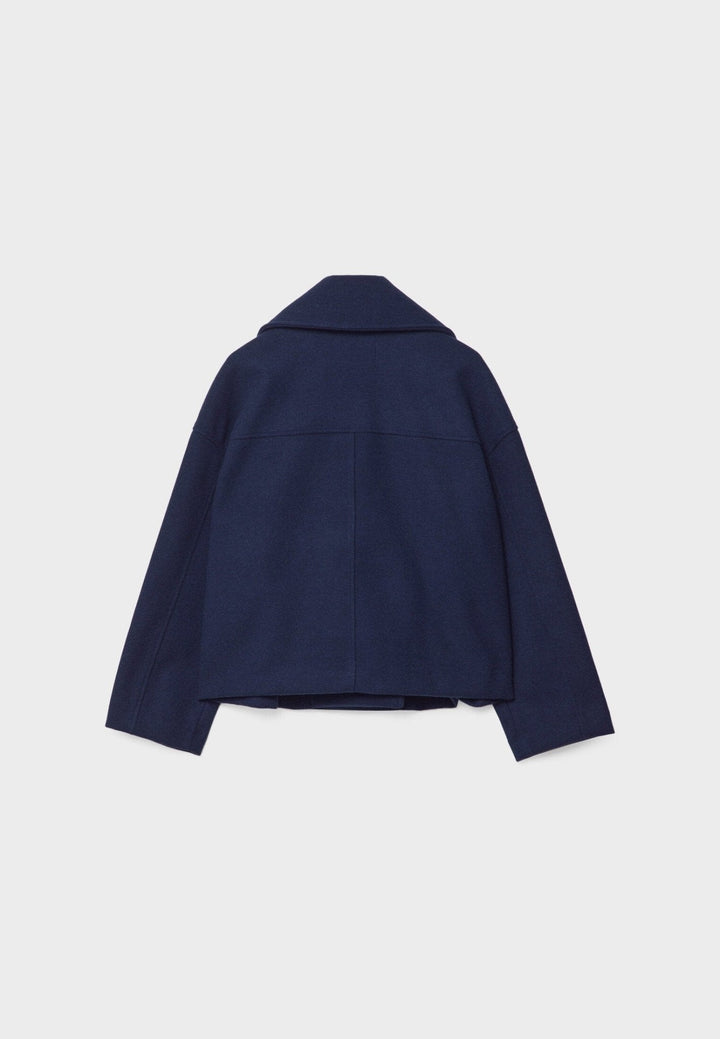 Versatile women's crop jacket, double-breasted style, perfect for elegant casual or office wear.