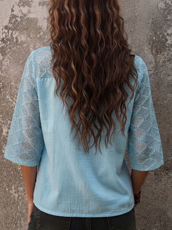 Relaxed fit bohemian women's tunic featuring a V-neck and intricate crochet details, ideal lightweight summer wear.