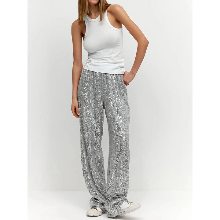 Women's dazzling silver sequin pants, perfect for glamorous evening partywear.