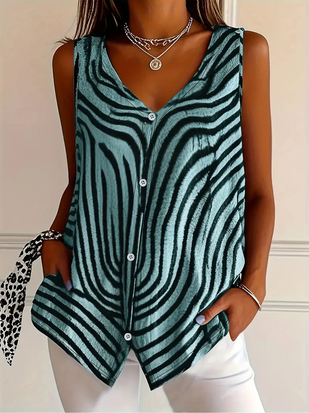 Women's striped sleeveless blouse with button front, perfect for casual summer wear.