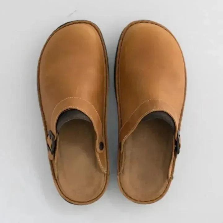 Supportive men's casual slippers, ideal for indoor comfort & outdoor durability.