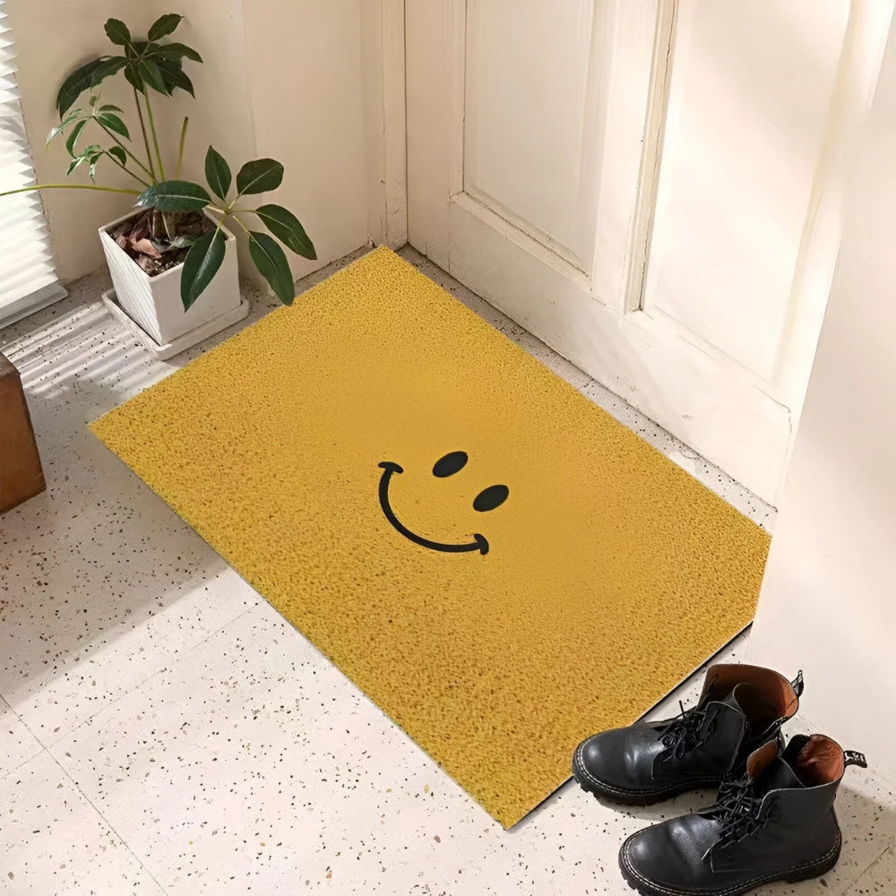 Cheerful unisex doormat with a smiley face design. Non-slip, perfect for indoor & outdoor use.
