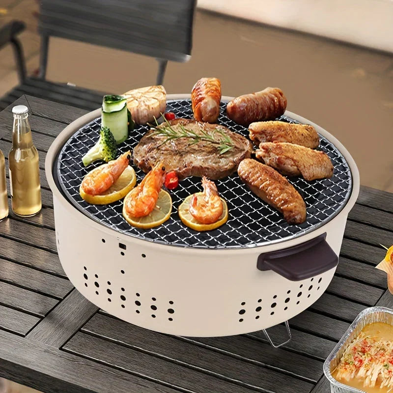 Compact, portable, smoke-free charcoal grill for outdoor cooking on balconies, camping trips. Easy to clean.