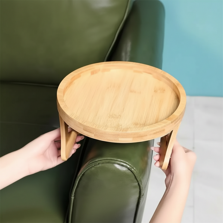 Folding wood armrest tray table securely grips sofa, ideal for holding snacks & beverages in small spaces.