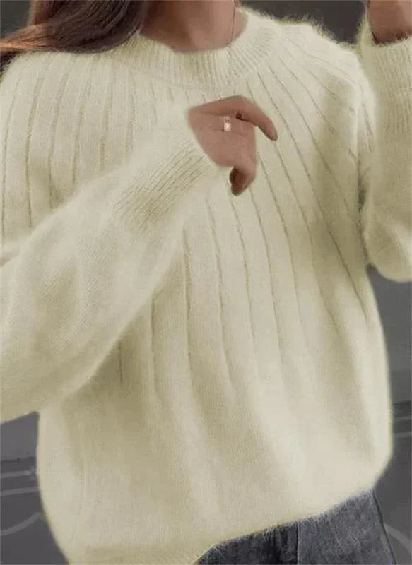 Cozy women's Sofie cashmere sweater, a warm & stylish long sleeve top for cold weather.