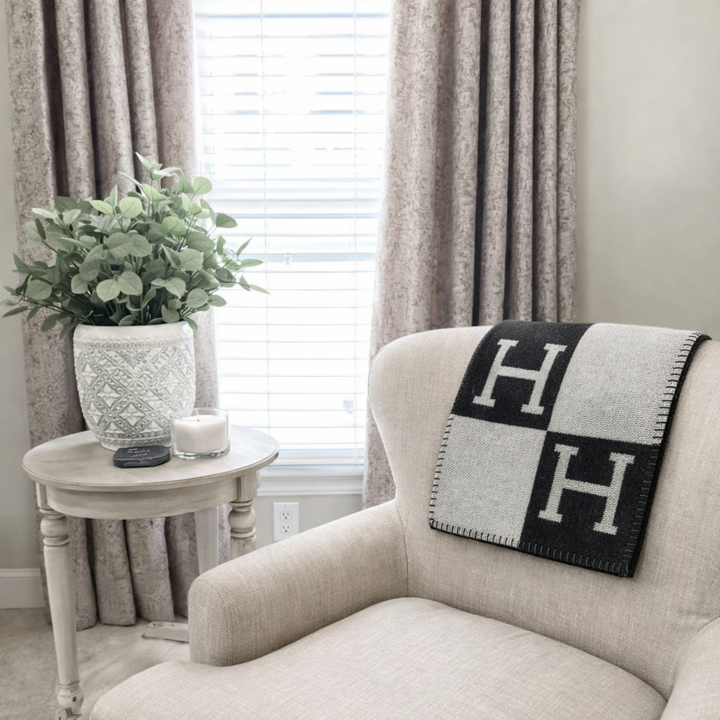 Elegant neutral throw blanket, a soft and cozy home decor accent for living rooms, bedrooms, and year-round style.