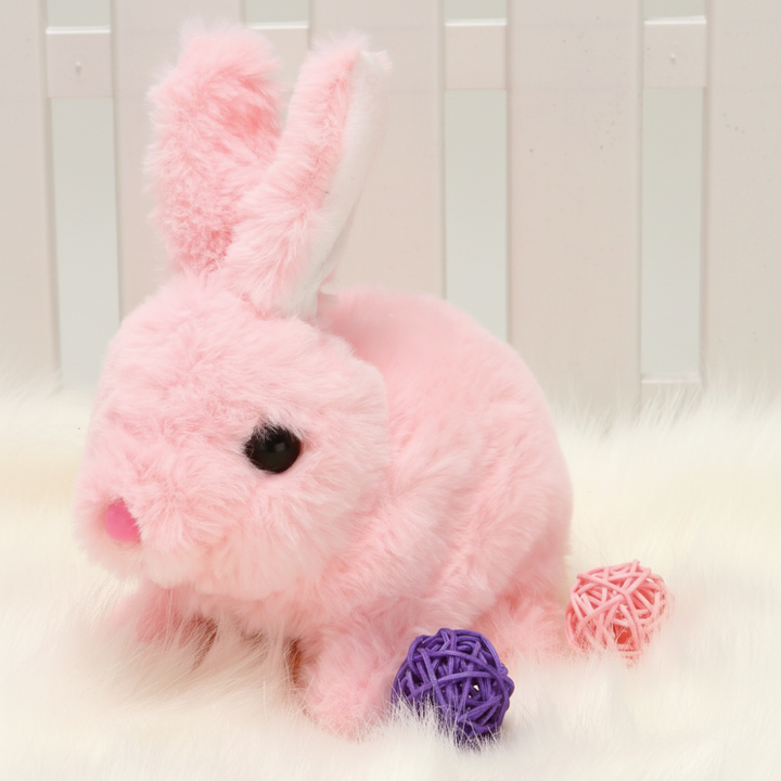 Cute unisex stuffed rabbit toy with long floppy ears, a gentle gift for children's play.