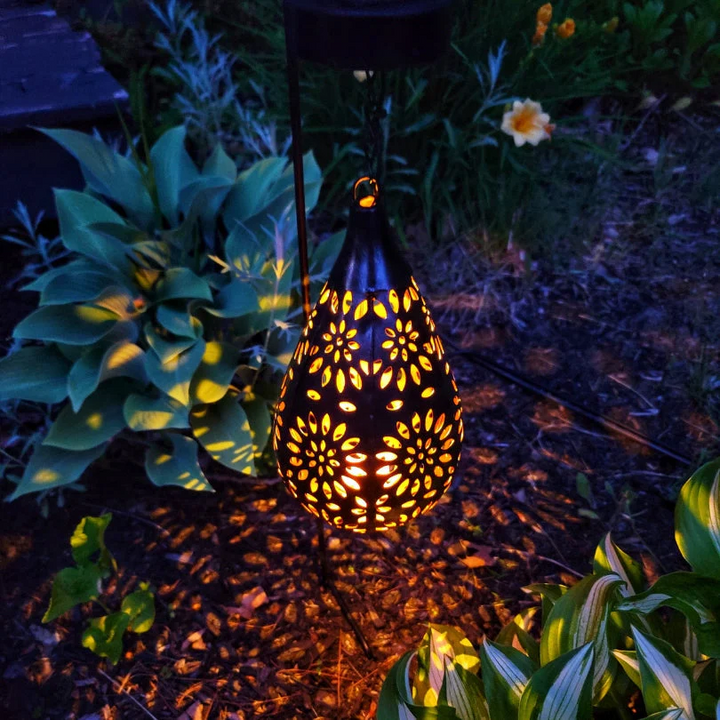 Sustainable LumaBright solar lamp, a weather-resistant hanging lantern for beautiful outdoor & garden lighting.