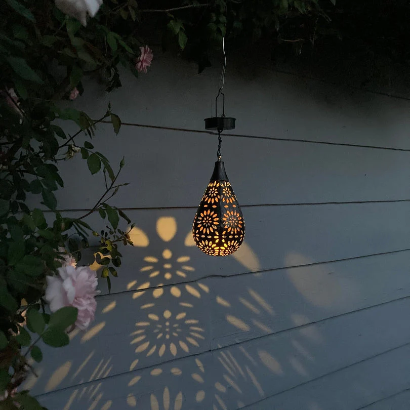 Outdoor hanging lantern by LumaBright. Solar-powered, eco-friendly patio & garden lighting solution.