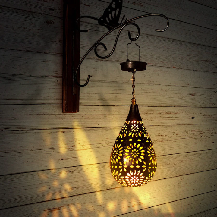 LumaBright solar outdoor hanging lantern, perfect for garden & patio eco-friendly lighting. Weather resistant.