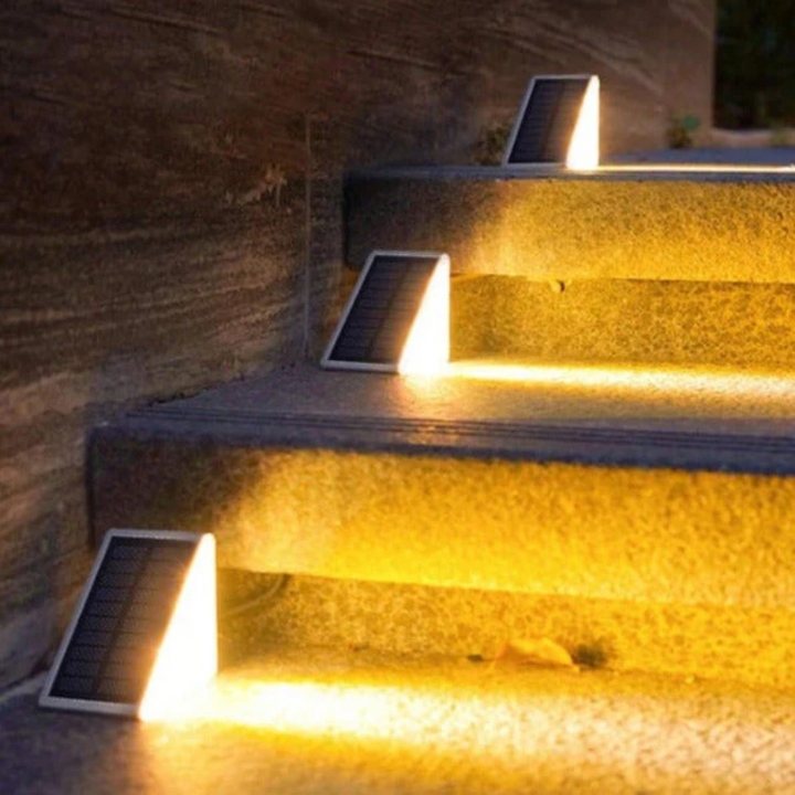 Solar-powered stair lights for outdoor steps. Brighten gardens, patios & decks for enhanced safety and beautiful ambiance.