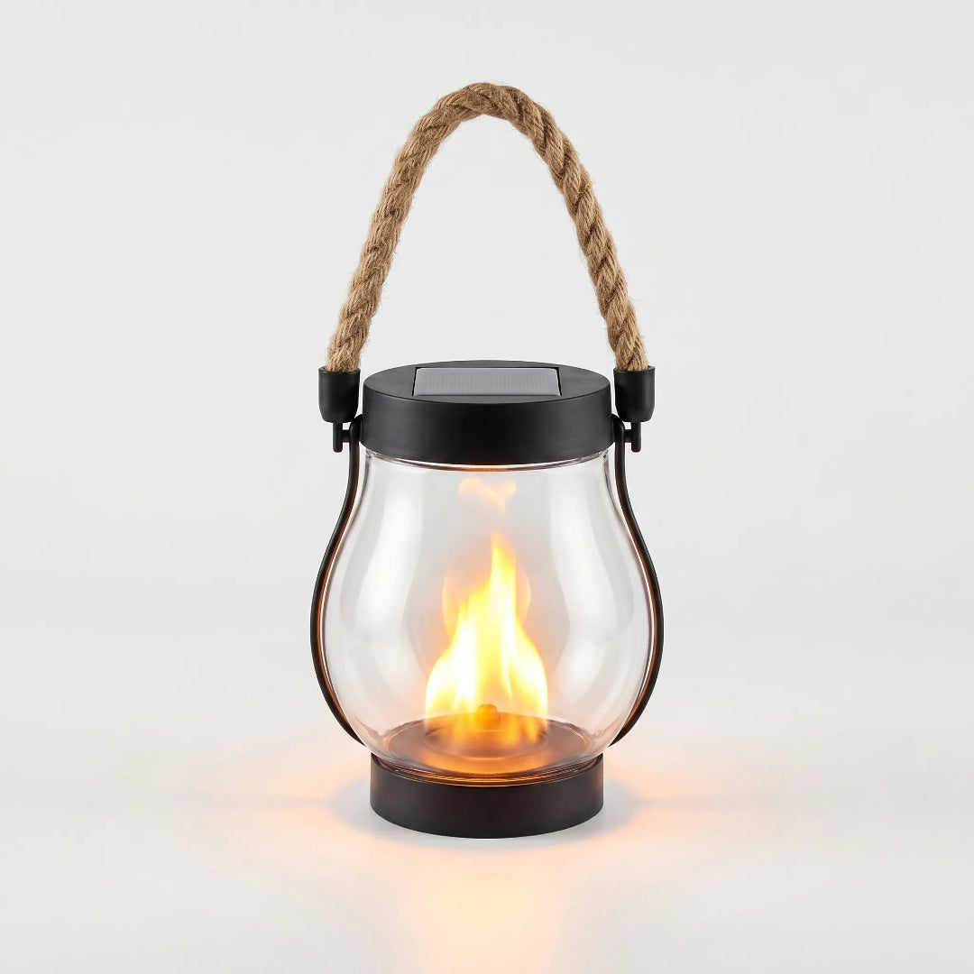 Bright LED solar outdoor light, featuring a hanging lantern design & flickering flame, perfect for pathways.