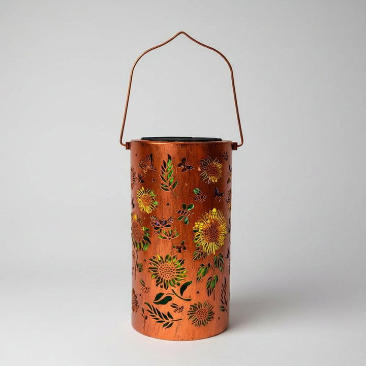 Elegant solar garden lantern featuring a unique floral design, casting a beautiful warm glow for outdoor ambiance.