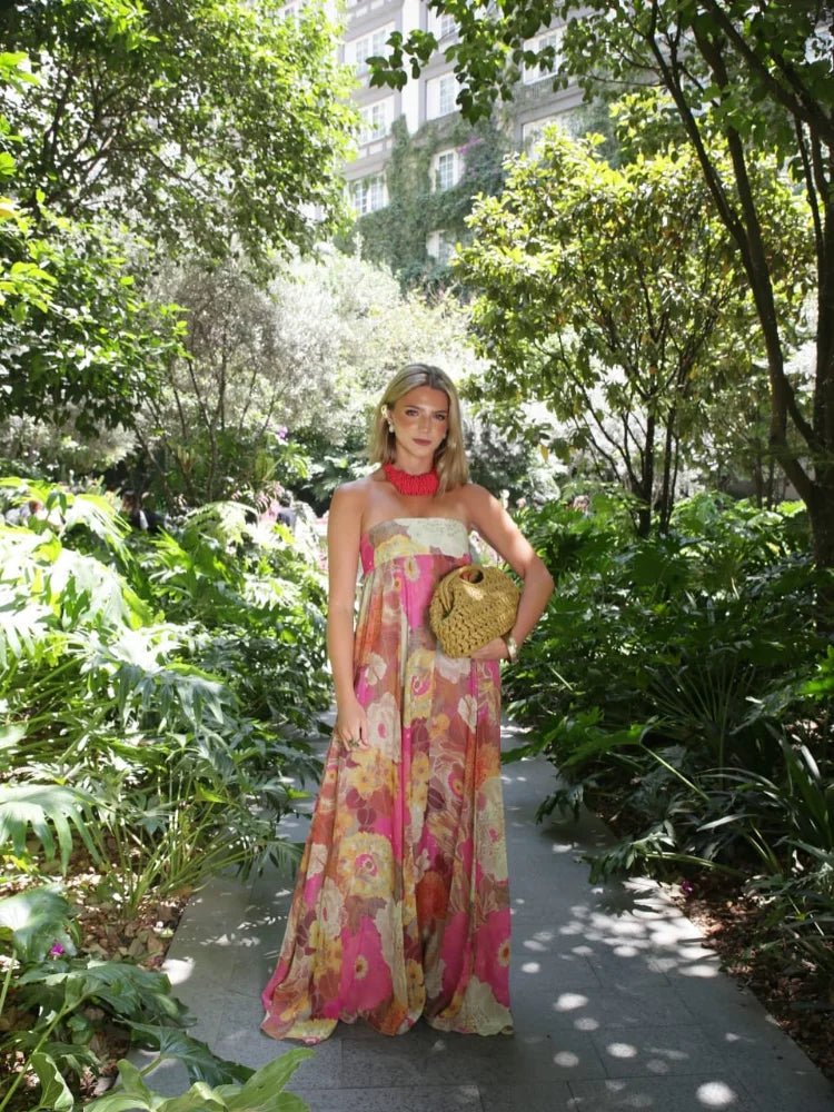 Stylish women's floral strapless maxi dress, a versatile elegant cocktail or party dress for all occasions.