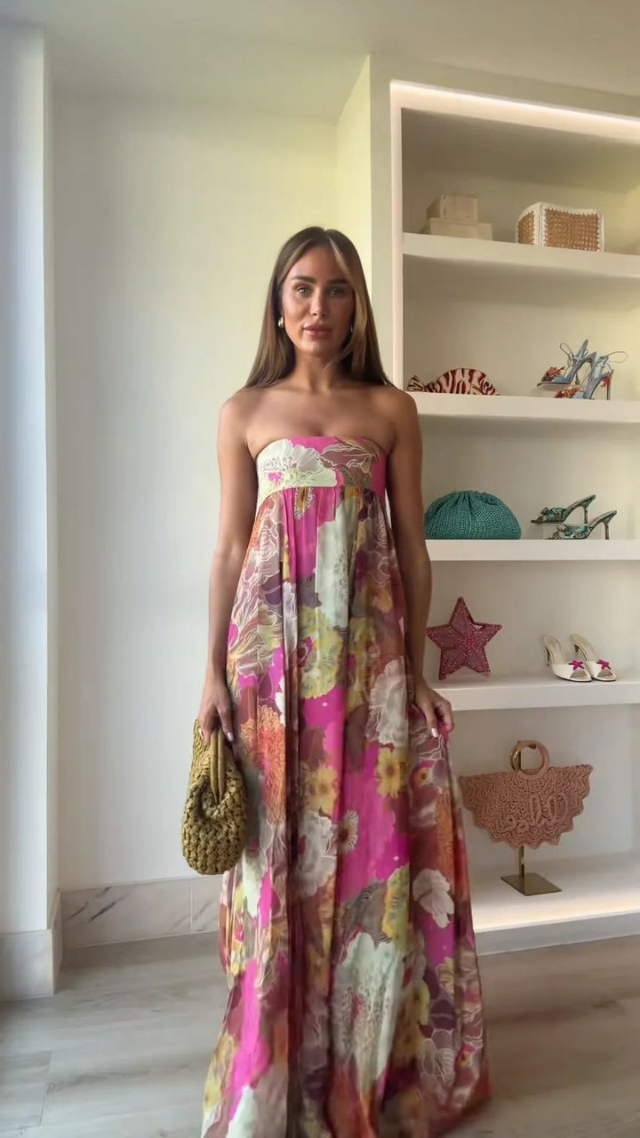 Modern elegant women's strapless floral maxi dress. Perfect formal wear, evening gown or sophisticated party dress.