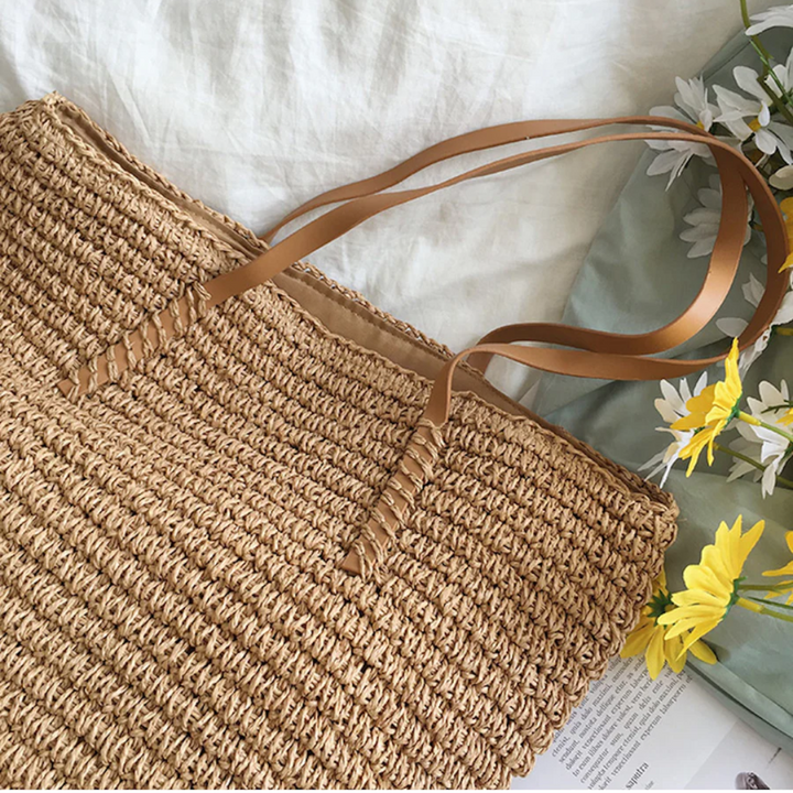 Elegant white woven tote bag, women's spacious shoulder bag for stylish daily fashion.