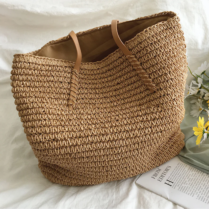 Stylish brown woven shoulder bag for women, spacious & durable for everyday use.